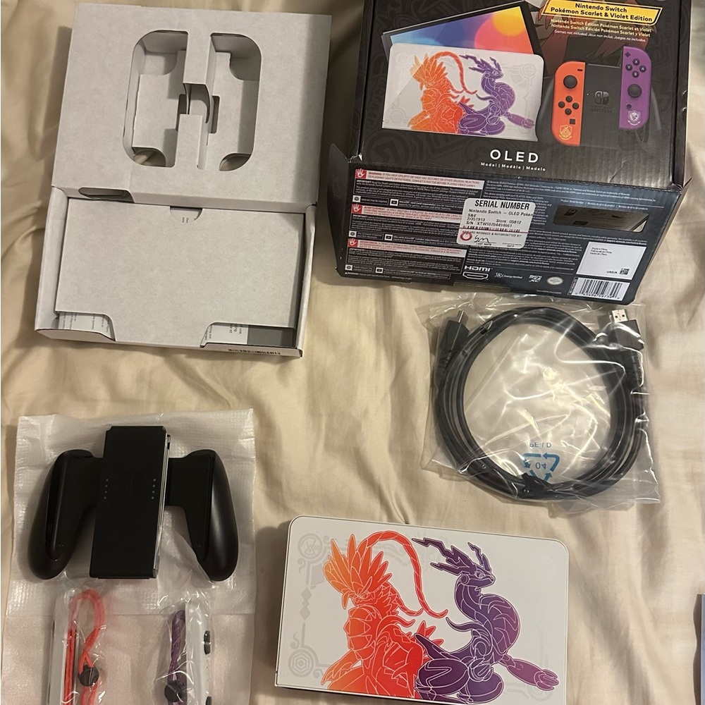 Nintendo Switch OLED Pokemon Edition with Red and Purple Joy-Con